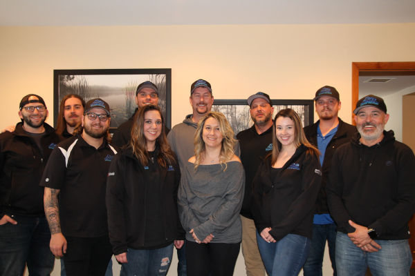 The roofing company team at Renowned Building Solutions