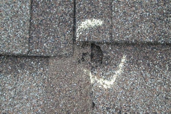 Example of documented hail damage from a roof inspection