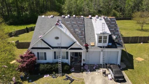 Work being completed by a residential roofing company